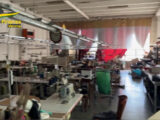 Verona, sfruttamento del lavoro. Gdf sequestra laboratorio tessile